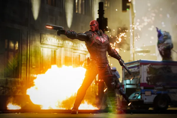 gotham knights rated on nintendo switch port red hood pointing a gun