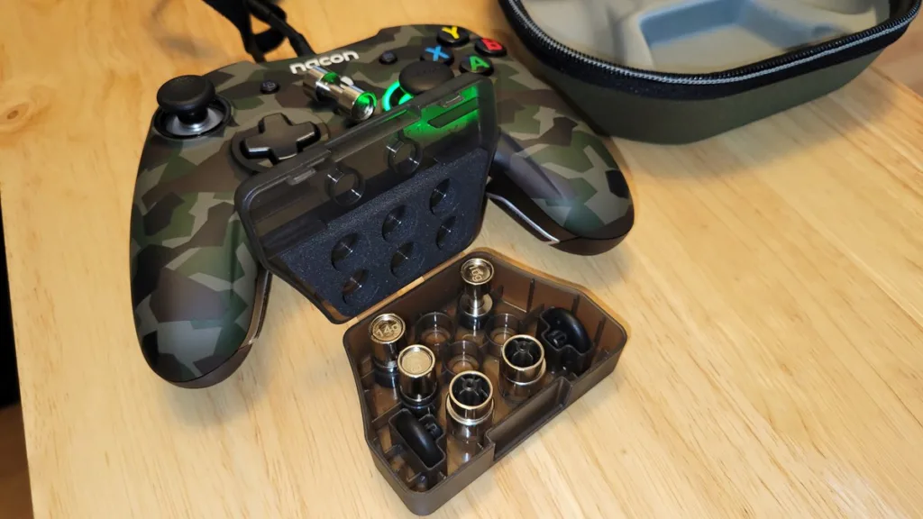 Shot of the Nacon Revolution X controller and various accessories.